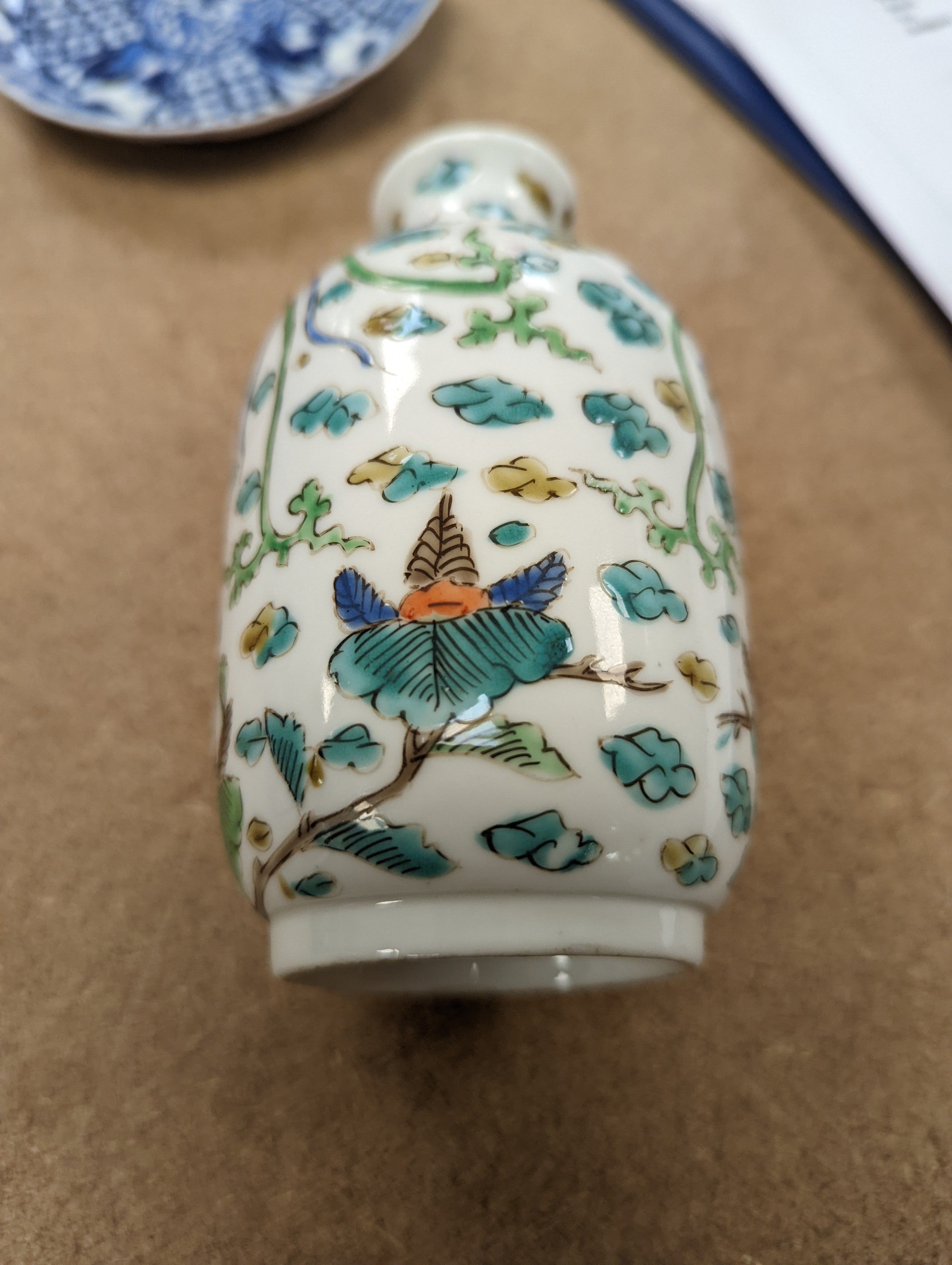 Two Chinese porcelain saucer dishes and an enamelled porcelain vase, 18th century and later, 12.5cm